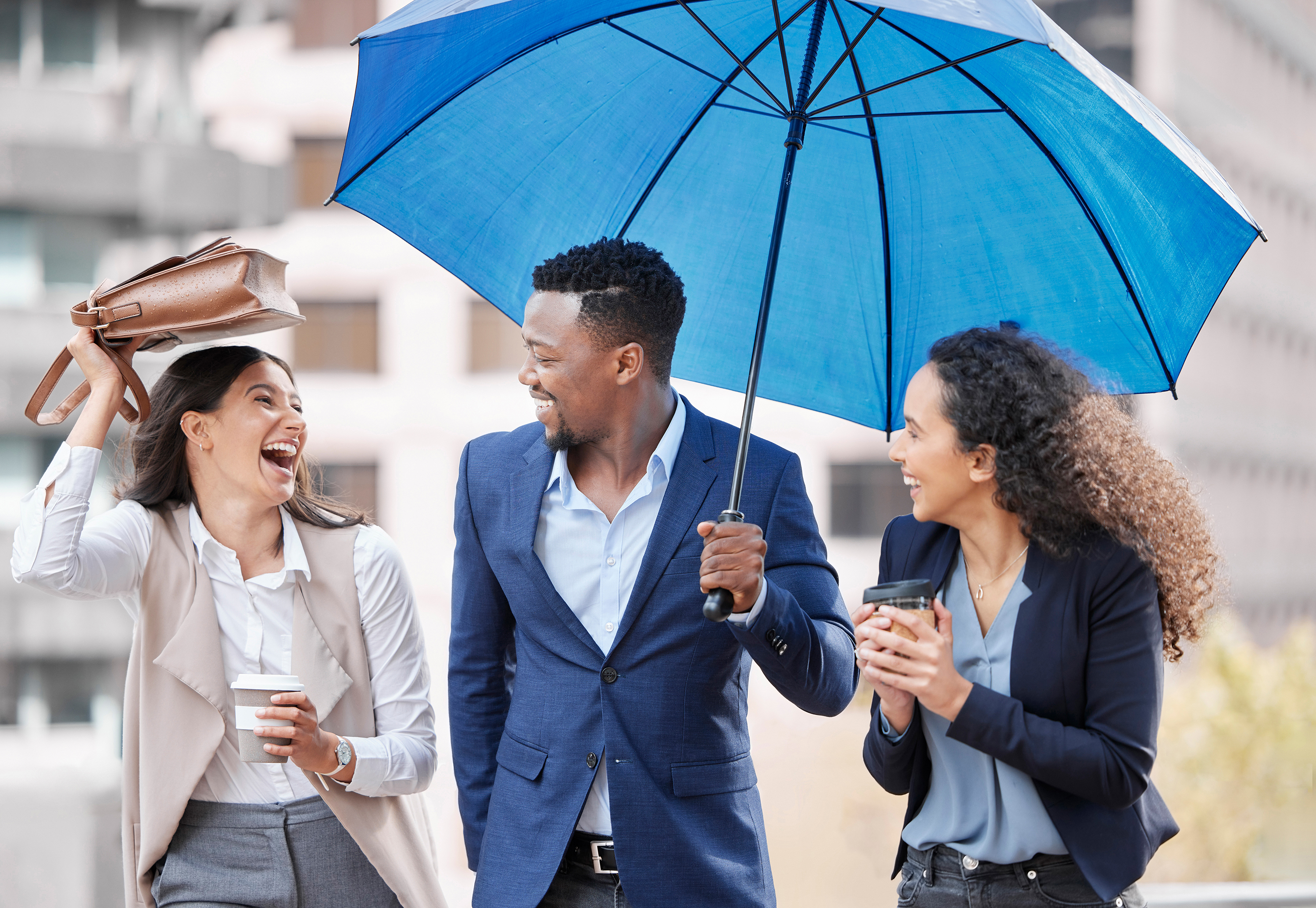 Business people with umbrella